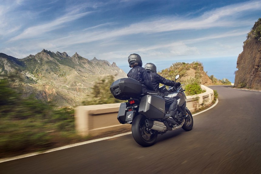 Riders on the road with a Honda NT1100