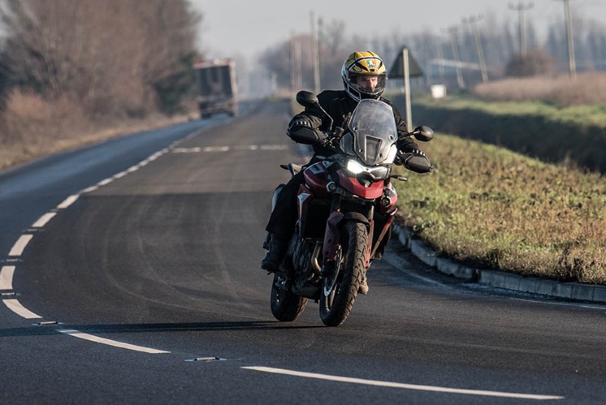 Motorcyclist riding in winter